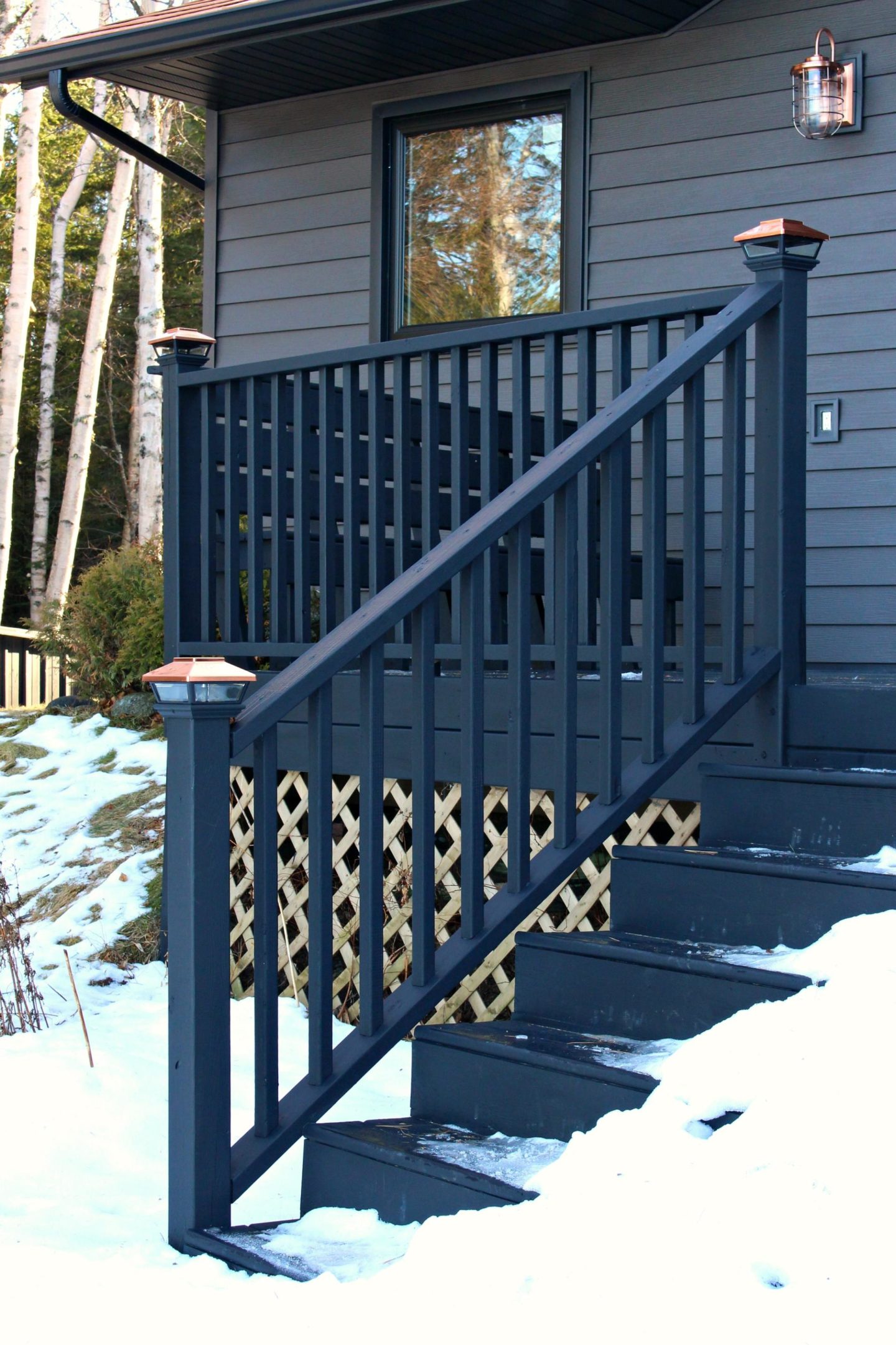 Black Deck Stain + Copper Solar Deck Caps | Dans le Lakehouse