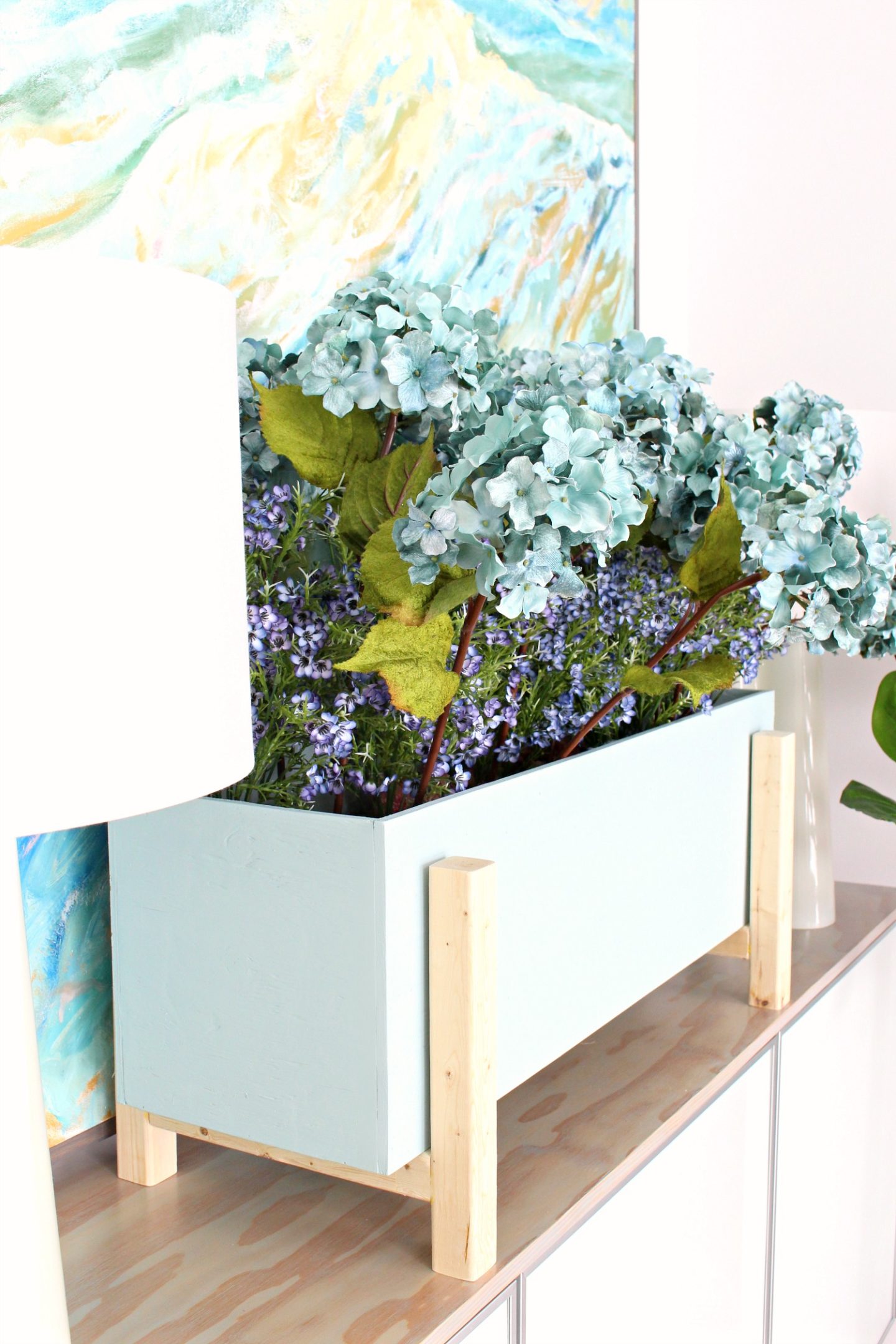 Learn How to Make This Modern DIY Planter Box for Faux Plants with Leftover Plywood and Wood Scraps #diy #homedecor #diyhomedecor #woodworking #plywoodprojects #diyplanter