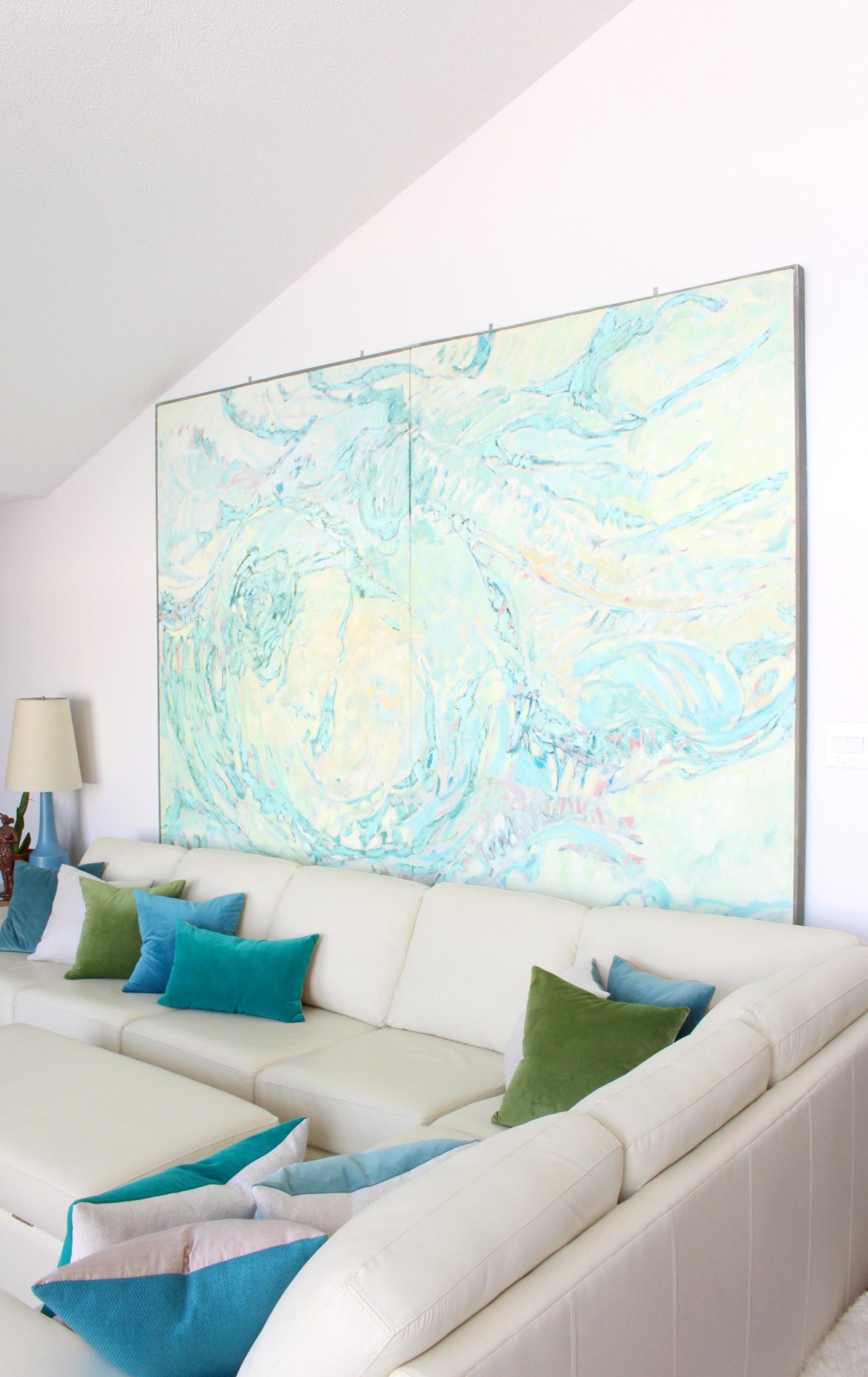 How to Hang Large Art + How to Put a Sofa in Front of Art Without Causing Damage