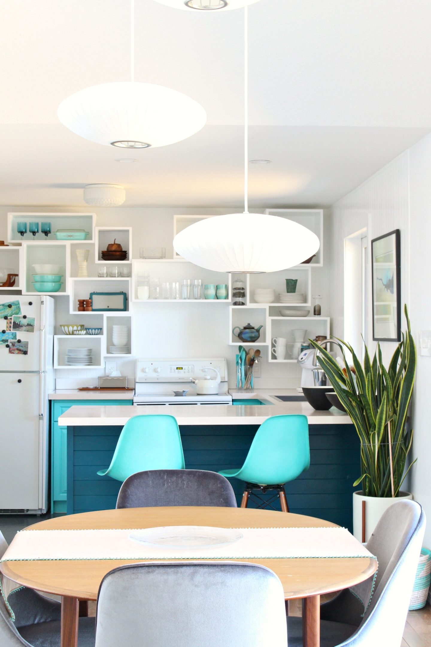 Lake House Kitchen with DIY Wall Cubbies Instead of Open Shelving - a Modern Take on Open Shelving in Kitchens. #openshelving #teal #colorfulhomedecor