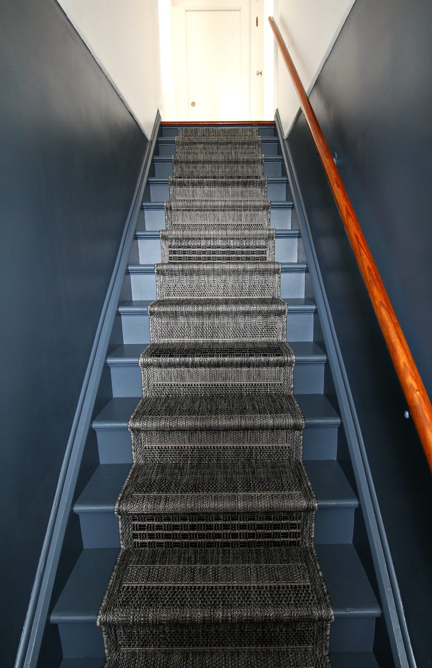 Stairwell Painted Dark Grey with Color Block Walls
